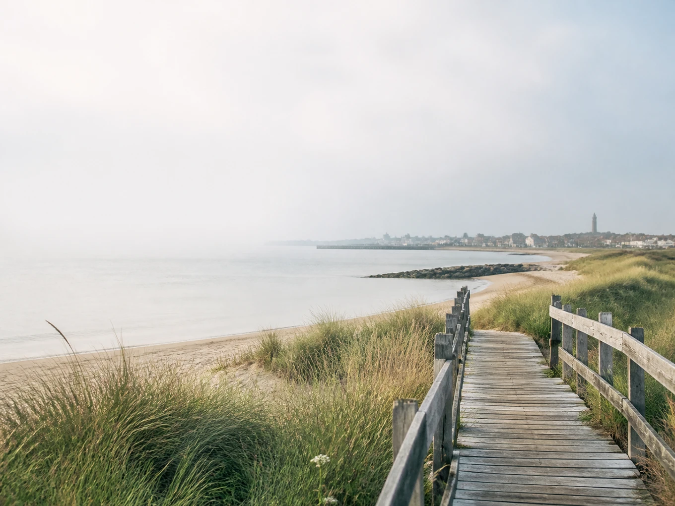 A weathered boardwalk overlooking the Provincetown shoreline